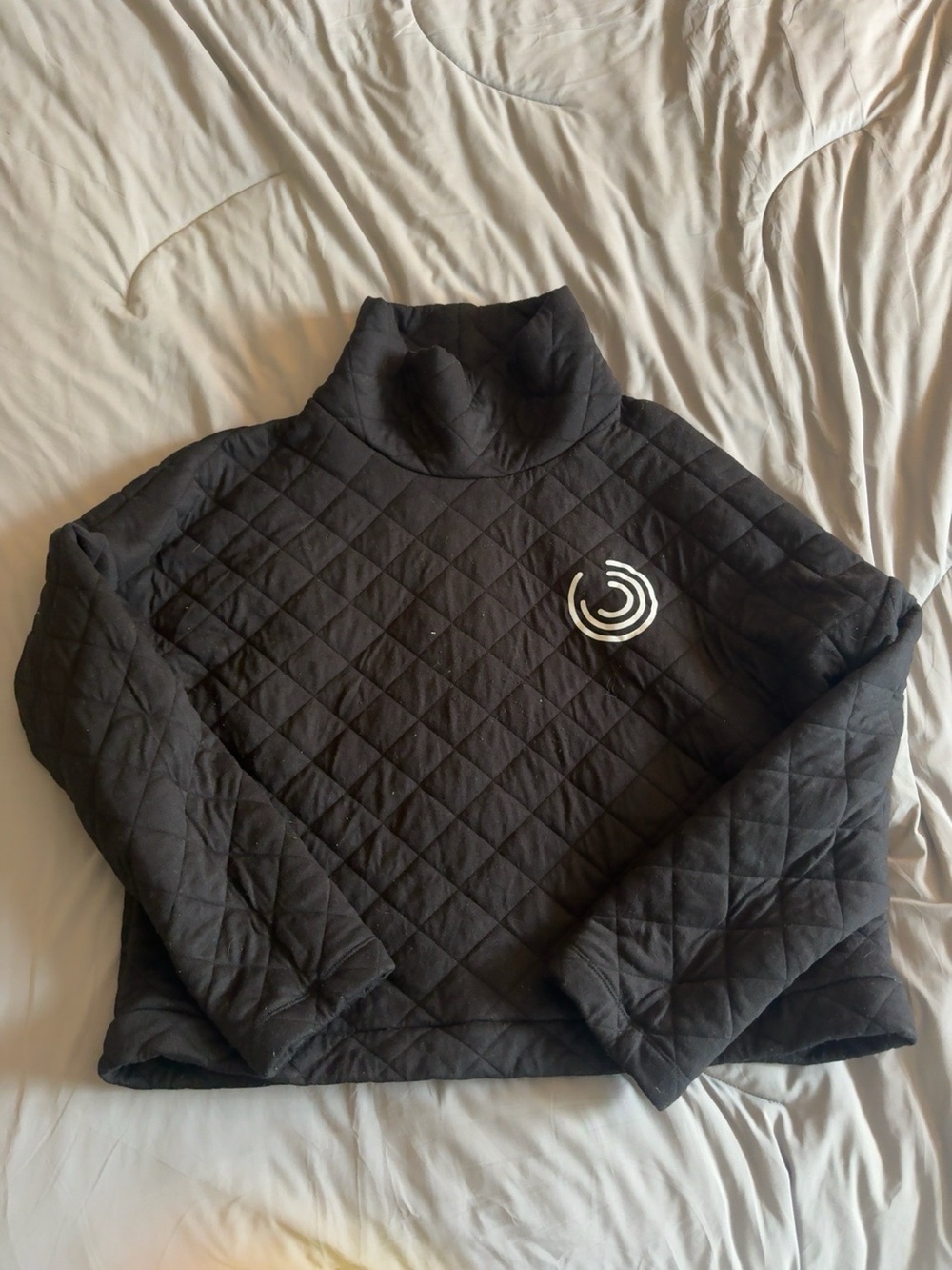 a GapFit quilted pullover